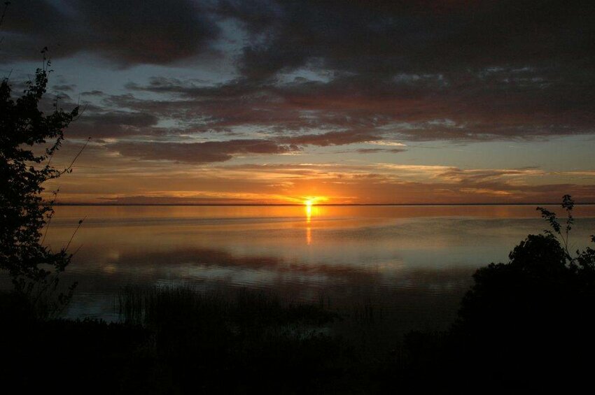 The sun rising on Lake Apopka, as seen from the lakeside observation tower on the Clay Island loop.