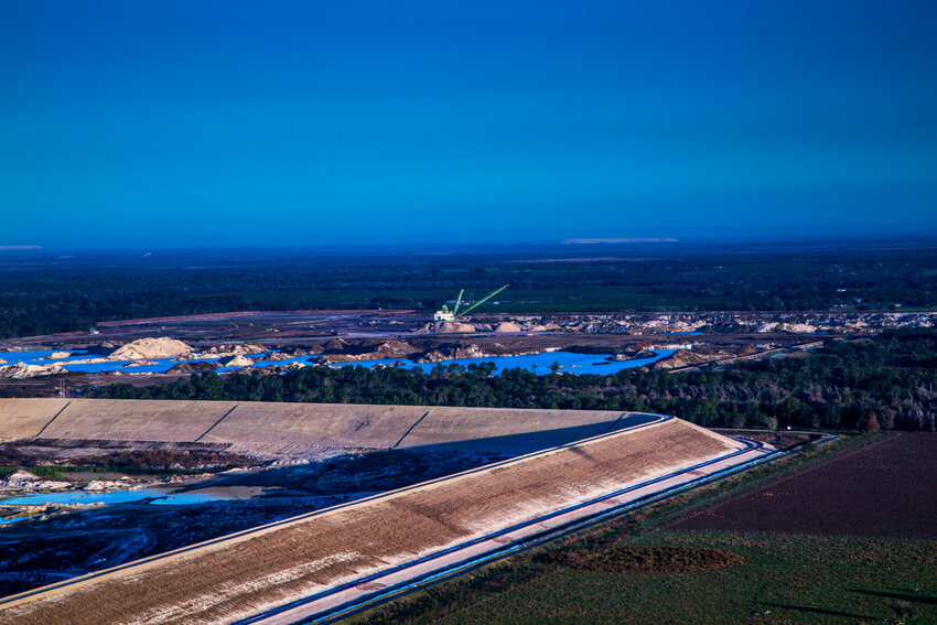 The state has been riveted on the drama unfolding at the Piney Point phosphate mining site near Tampa Bay, but the state is littered with similar facilities, like the one pictured here, that threaten other coastal estuaries.