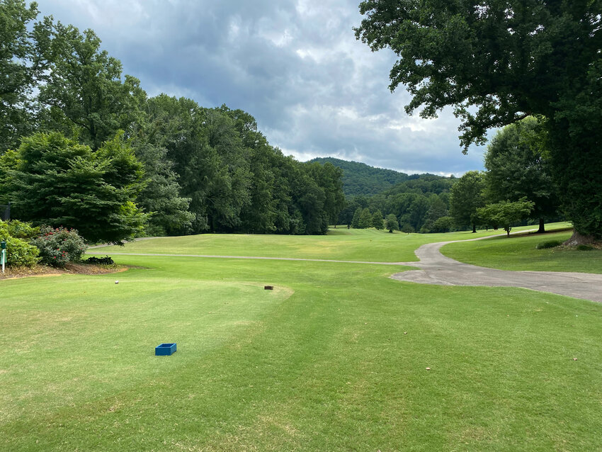 The first hole at Tryon CC. A meandering (and menacing) creek runs across the fairway and cannot be seen from the tee.