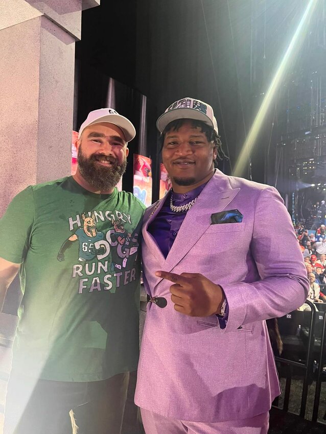 Jason Kelce, a center for the Philadelphia Eagles, and Jalen Carter at the 2023 NFL Draft.