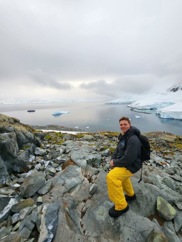 John stands upon a rocky Antarctic shore. (Courtesy of John Humphreys)