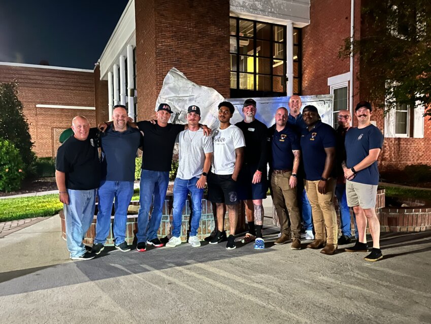 Members and supporters of the Apopka Professional Firefighters Association celebrate after the City Council approved its contract.