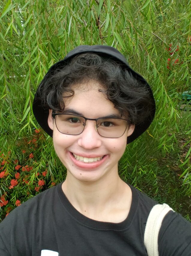 2024 Apopka High grad Colin Poon in a Taiwanese butterfly garden.