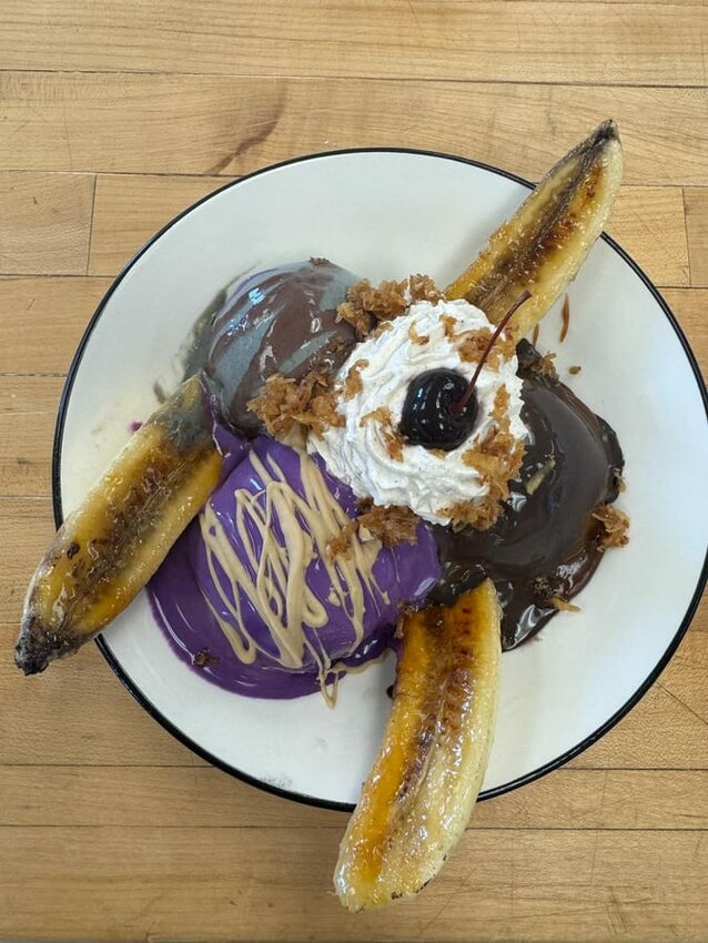 The Geode Sundae: Bruleed bananas with scoops of black sesame, ube, and coffee chocolate ice cream, with bada bing cherry coulis and red miso caramel. Finished with almond white chocolate drizzle, candied coconut, and a cloud of spiced cream was a winner for the Wekiva High Culinary Team.