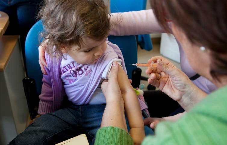 Getting children vaccinated can protect them and others from potentially deadly diseases. BSIP/UIG via Getty Images
