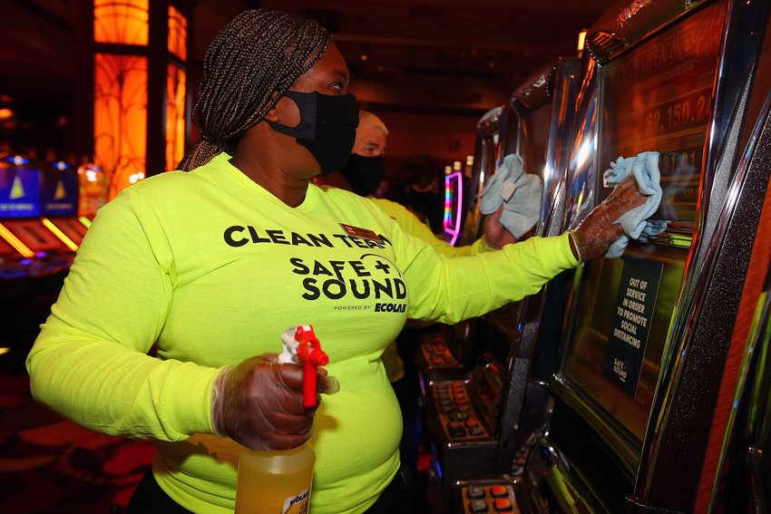 Florida's Seminole Casino Coconut Creek, cleaning slot machines during COVID-19, photo from Seminole Casino Facebook