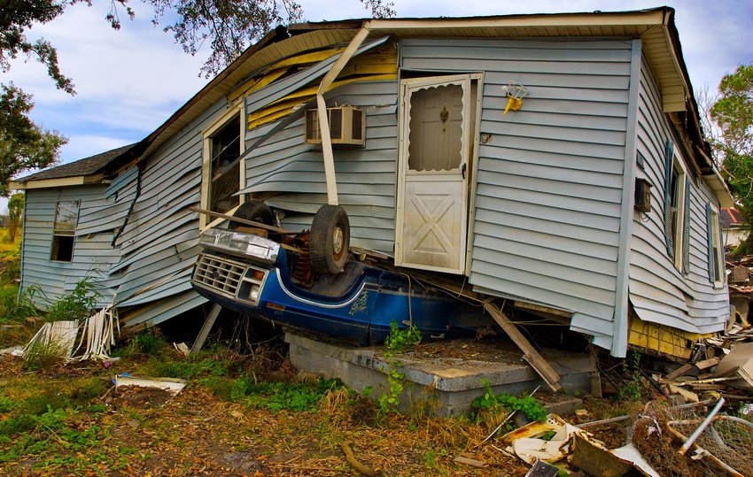 Hurricane-damaged house photo by John Middelkoop