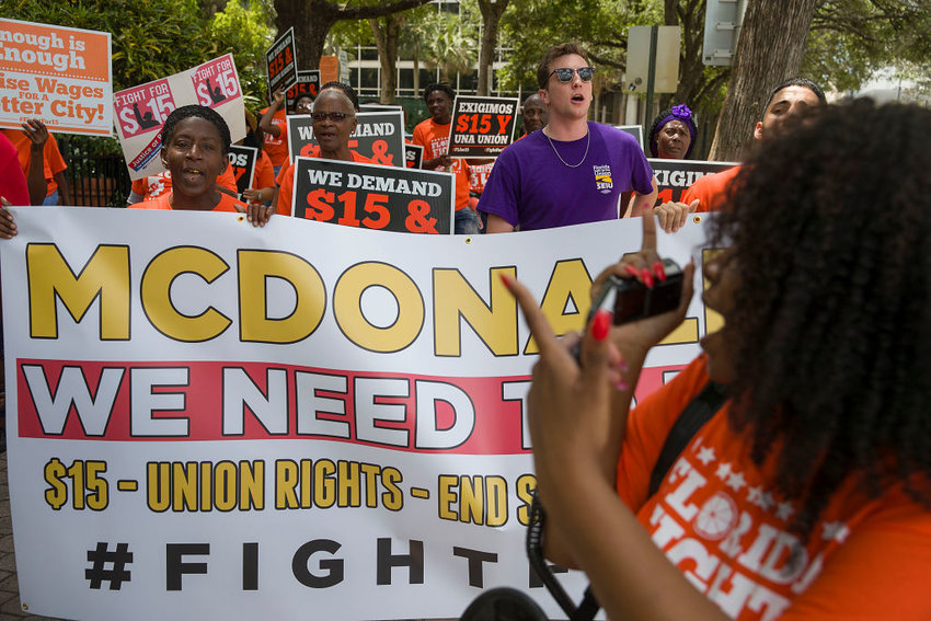 People gather together to ask  the McDonald&rsquo;s corporation to raise workers wages to a $15 minimum wage as well as demanding the right to a union on May 23, 2019 in Fort Lauderdale, Florida.  The nation wide protest at McDonald&rsquo;s was held on the day of the company&rsquo;s shareholder meeting. (Photo by Joe Raedle/Getty Images)