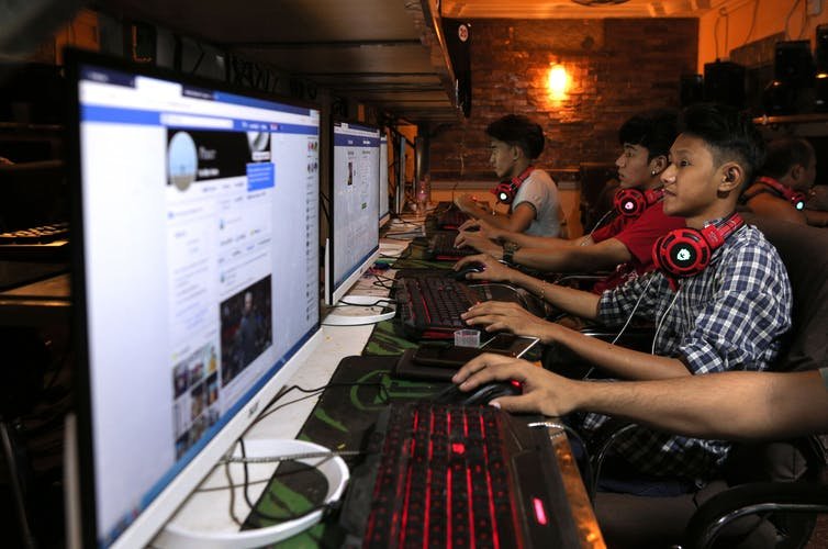 People tend to view social media posts more favorably when more people have liked, commented on or shared them, regardless of the quality of the posts. Sai Aung Main/AFP via Getty Images