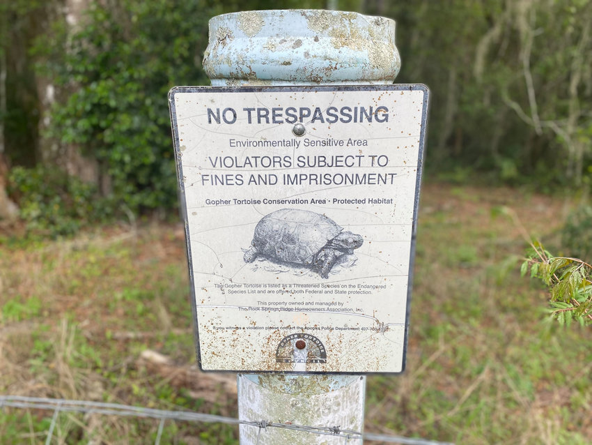 The signs still remain on the Gopher Tortoise Conservation Area for all to see.
