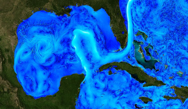 A satellite image of ocean heat shows the strong Loop Current and swirling eddies.