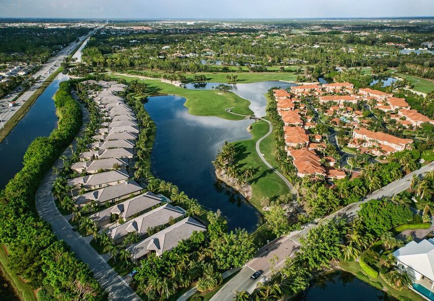 An aerial view of a manicured Florida golf community.