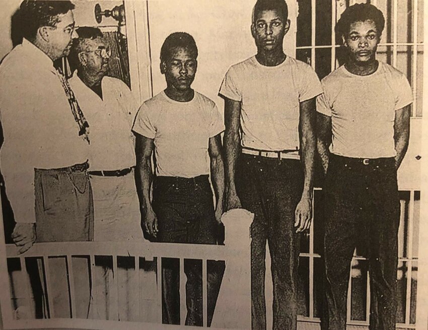 Three of the Groveland Four. Left to right: Sheriff Willis McCall, jailer Reuben Hatcher, Walter Irvin, Charles Greenlee, and Samuel Shepherd. Not pictured: Ernest Thomas, killed earlier by law enforcement.