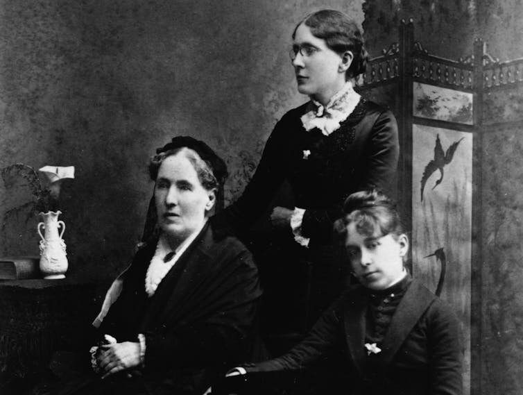 Frances Willard stands behind her mother, at left, and Anna B. Gordon, who worked as a secretary and lived in the Willard household.