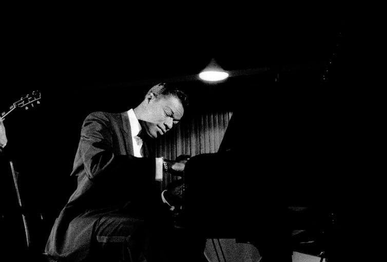 Nat King Cole performs in Copenhagen, Denmark, in April 1960.