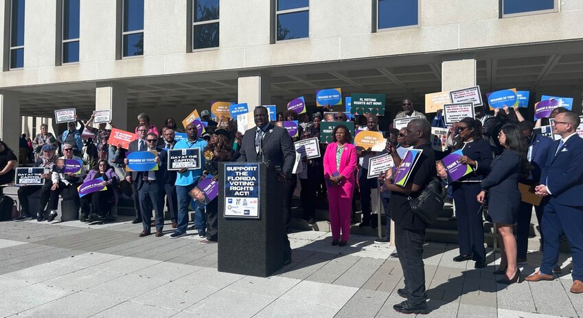 Genesis Robinson, executive director of Equal Ground, takes the podium at the voting rights day of action in Tallahassee on March, 26, 2025.