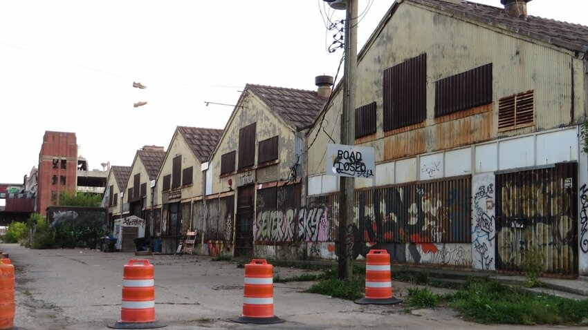 Dilapidated buildings in Detroit, Michigan. Detroit was an early adopter of the Suburban Experiment, and it’s reached the financial collapse stage earlier than other cities as well.