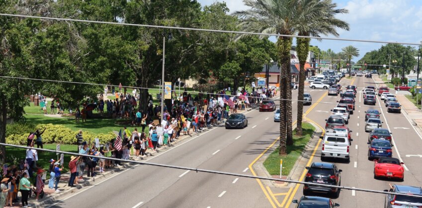 People of all ages joined in, lining Main Street and chanting for more than two hours. The protest remained peaceful, despite mixed reactions from passing drivers. No arrests or major incidents were reported.