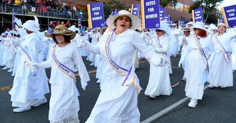 Women portraying suffragettes walk with the Pasadena Celebrates 2020 float at the 131st Rose Parade in Pasadena, California, Wednesday, Jan. 1, 2020. AP Photo/Michael Owen Baker
