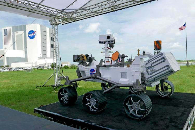 A replica of the Mars rover Perseverance is displayed outside the press site before a news conference at the Kennedy Space Center Wednesday, July 29, 2020, in Cape Canaveral, Fla. United Launch Alliance Atlas V rocket launch scheduled for tomorrow will transport the rover to Mars. John Raoux