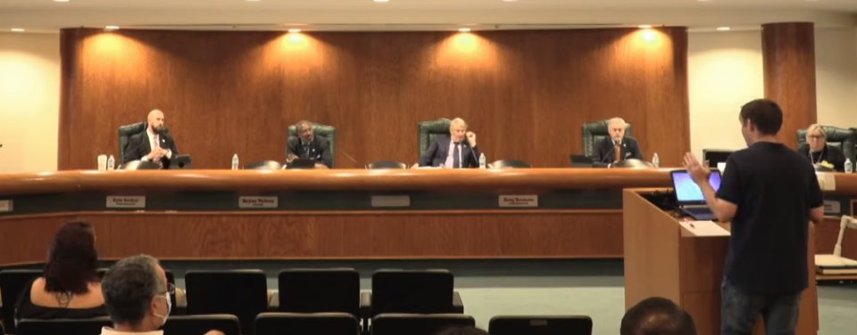 Sam Anderson, a police officer with the Apopka Police Department, presents to the Apopka City Council on August 19, 2020
