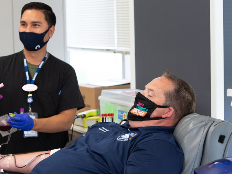 Orange County EMS Medical Director Dr. Christian Zuver donates convalescent plasma at OneBlood.