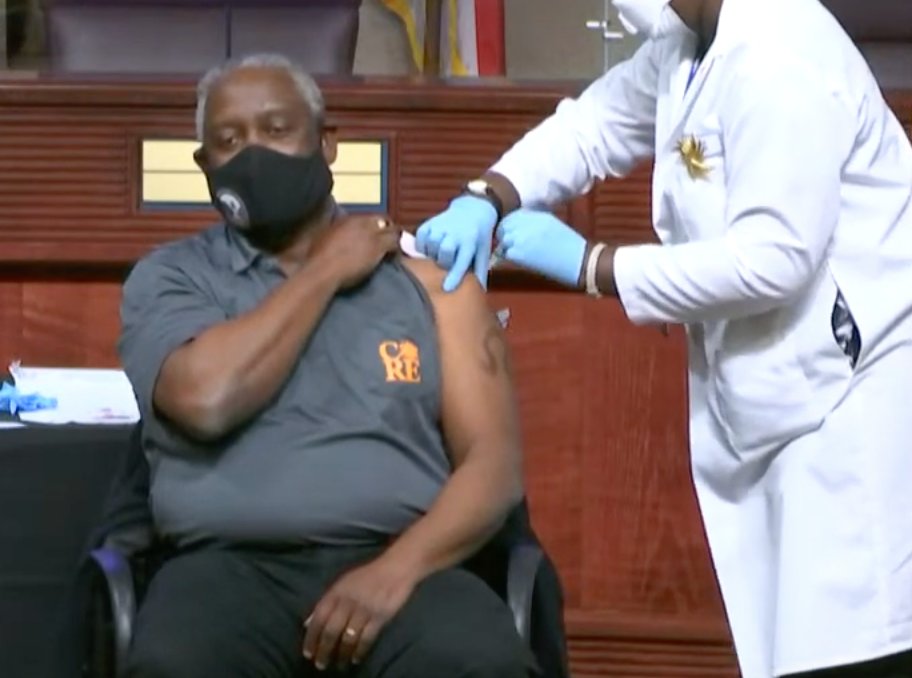 Orange County Mayor Jerry Demings receives the Moderna COVID-19 vaccine.