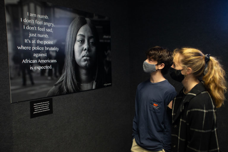 Members and guests of Orange County’s MLK Initiative view the Uprooting Prejudice exhibit at the Holocaust Memorial Resource & Education Center of Central Florida.