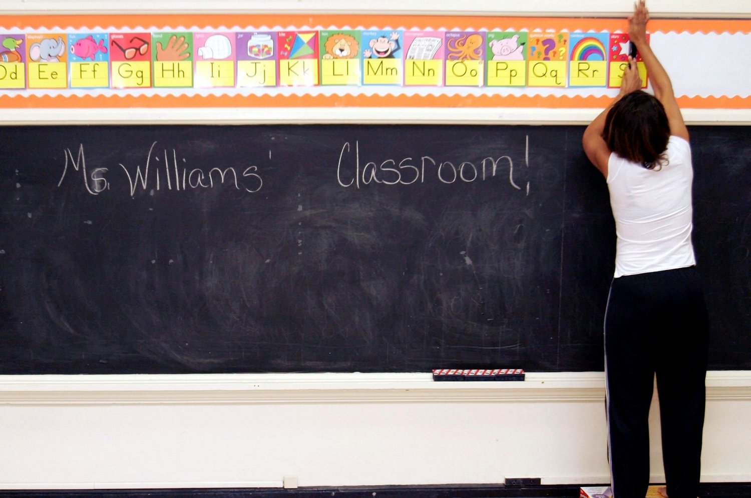 Teacher in her classroom. Photo by Dave Einsel/Getty Images