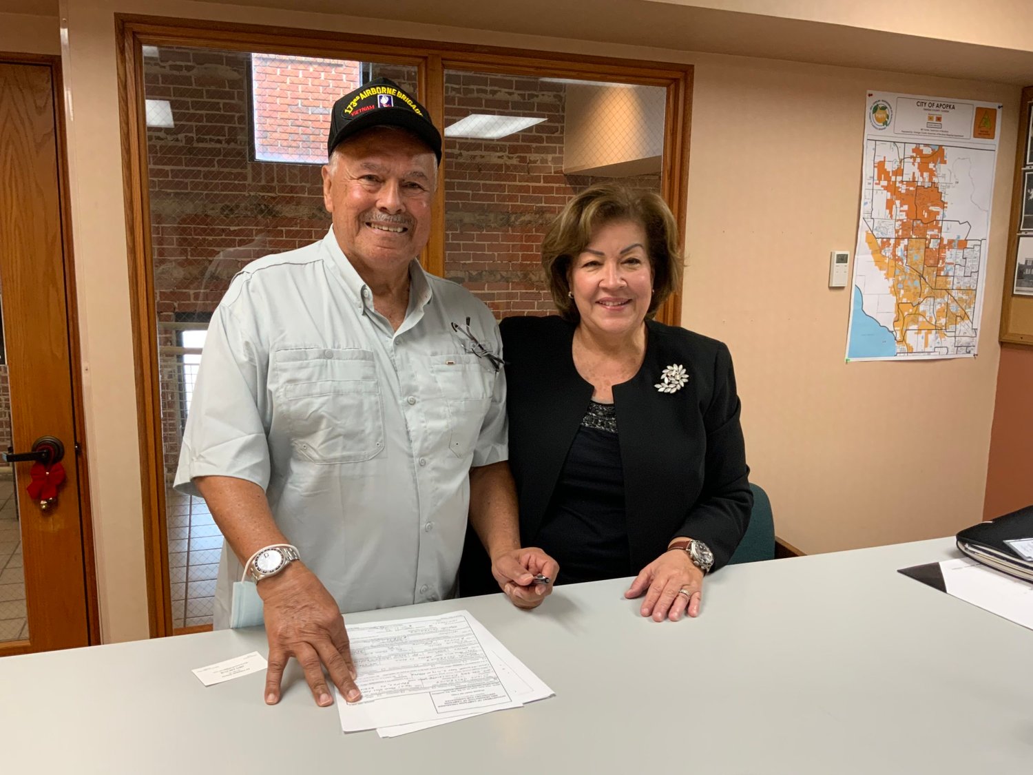 Commissioner Diane Velazquez with her husband Ed filed an application to run for Seat#2 this morning.