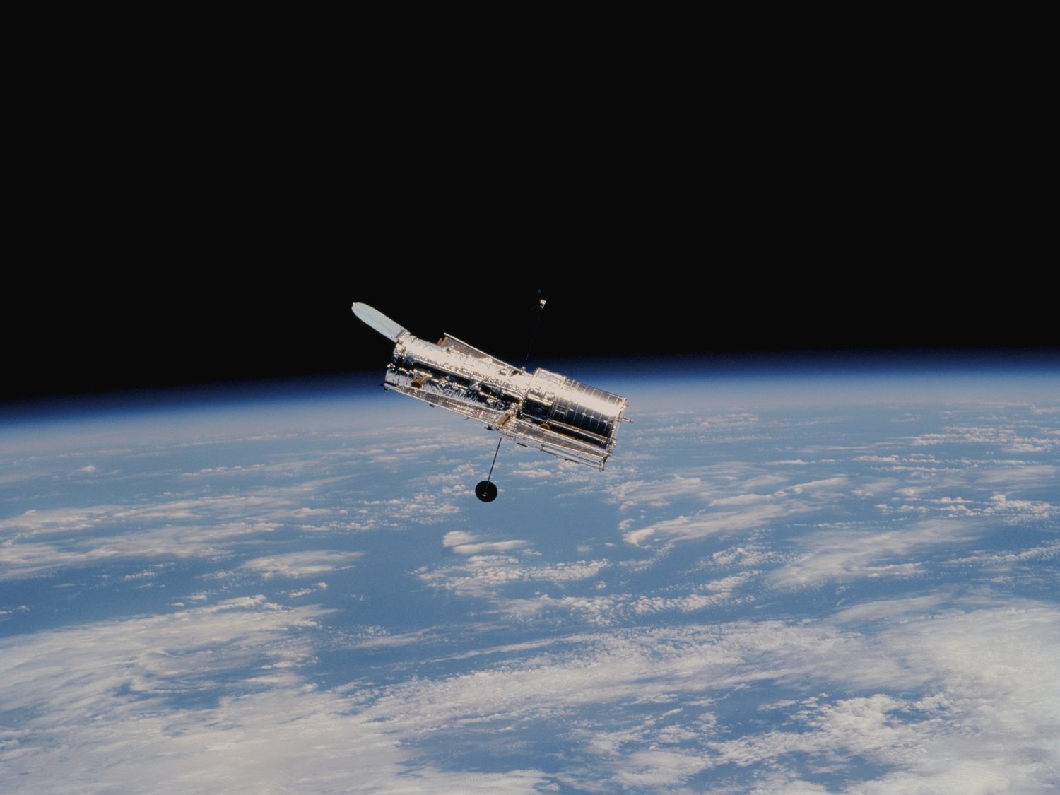 The Hubble Space Telescope after deployment on its second servicing mission (HST SM-02)