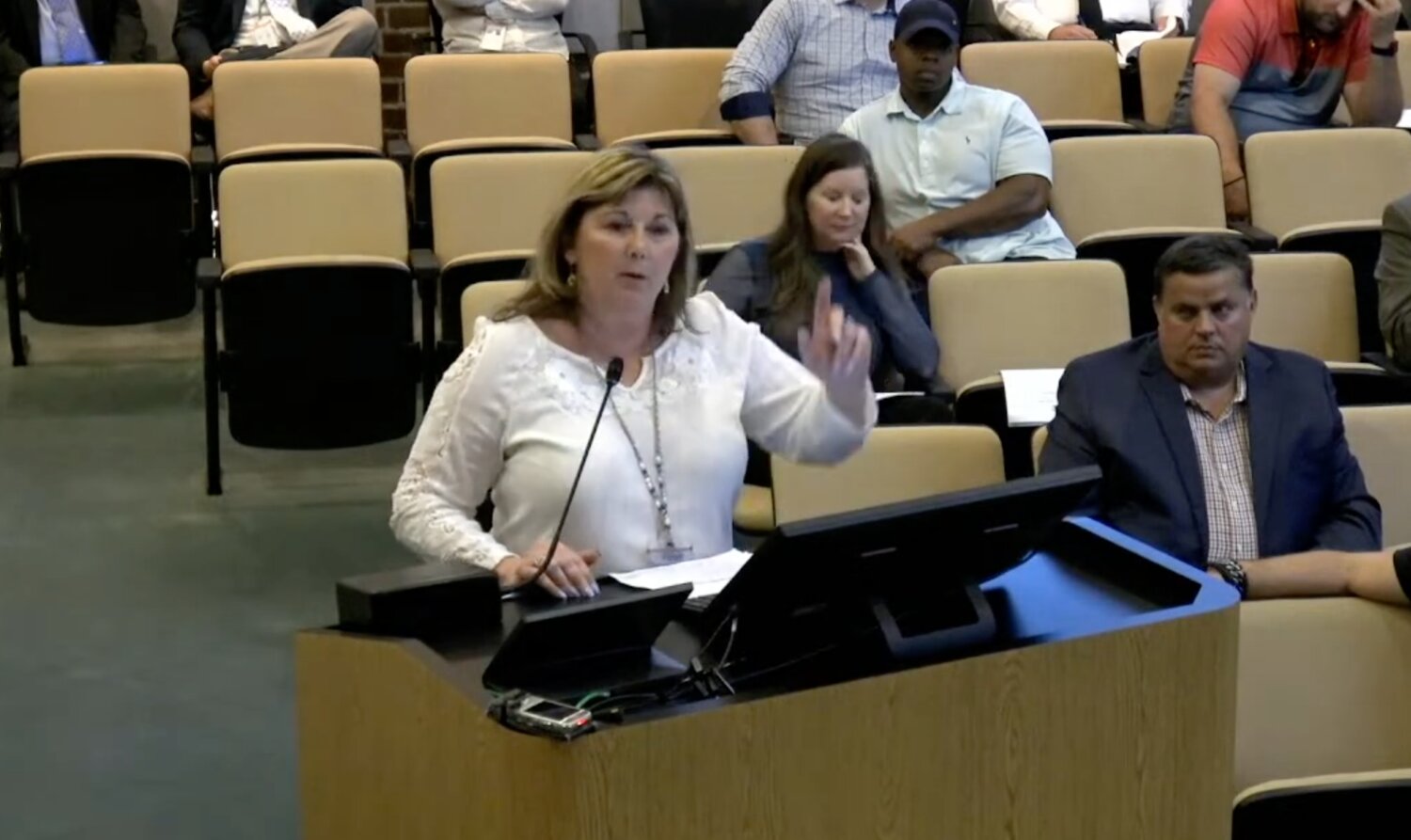 Apopka Transportation Coordinator Pam Richmond pushes back on the Oaks at Monroe's request to waive a left turn lane at its development.