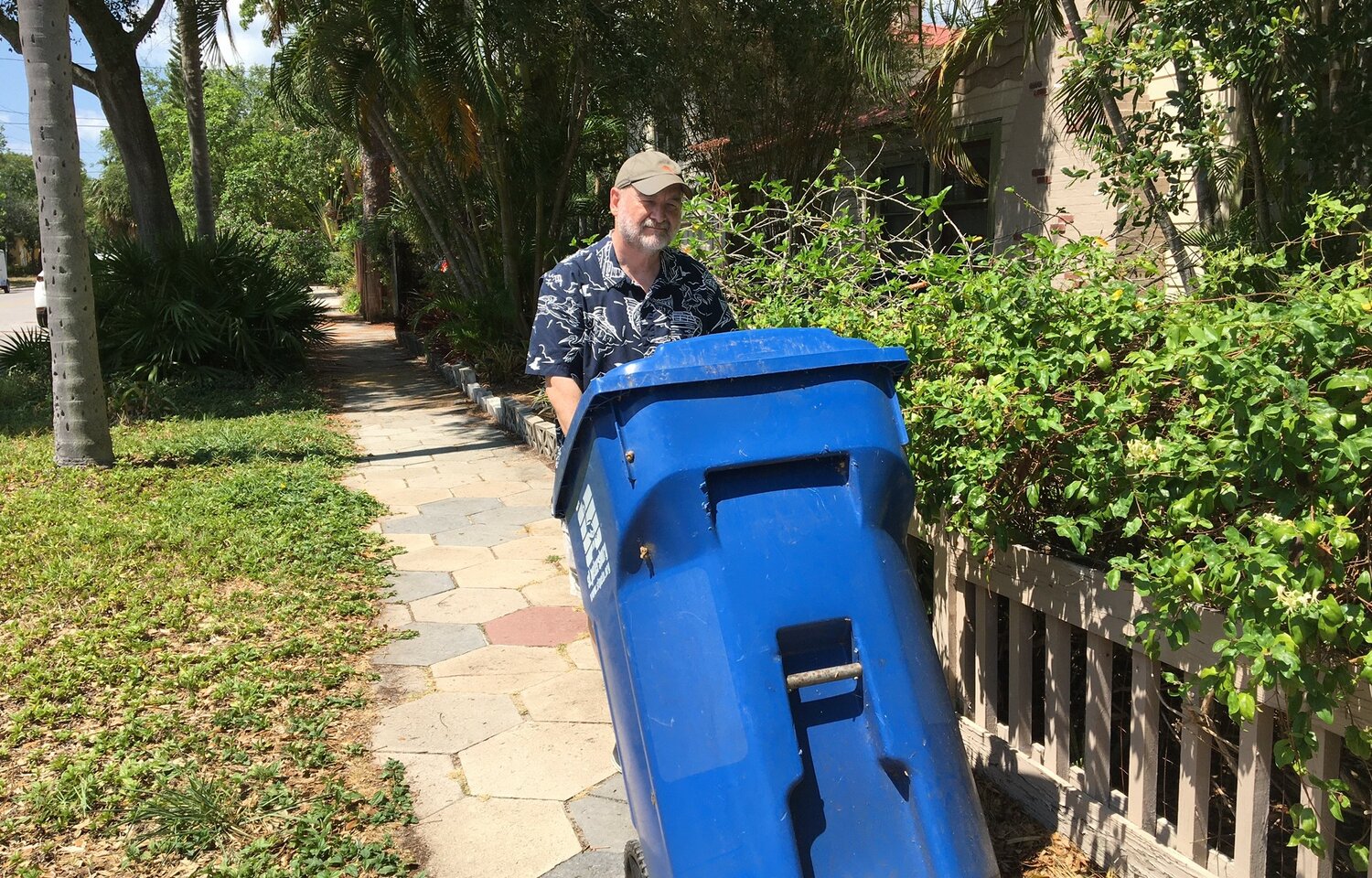 Columnist Craig Pittman does the two-step with his recycling bin.