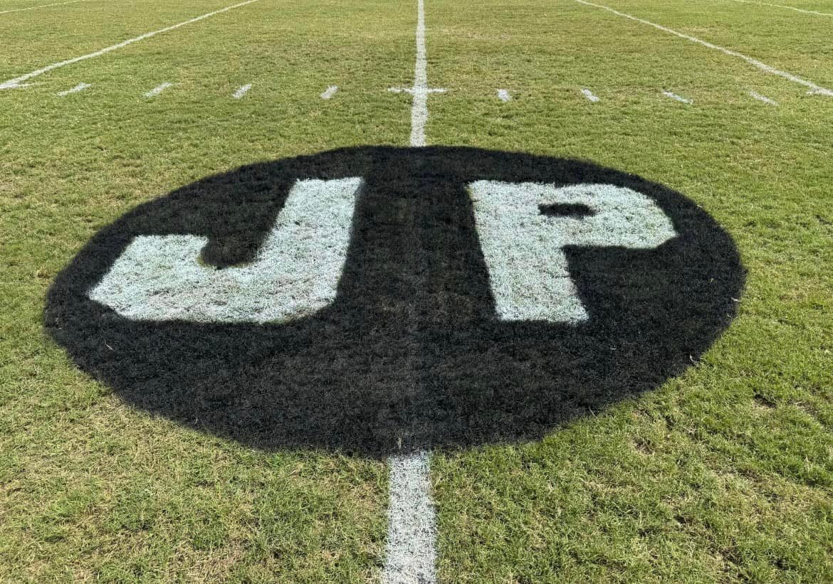 "JP" initials emblazoned on the Apopka High School Football Field in honor of Apopka Chief Editor John Peery.