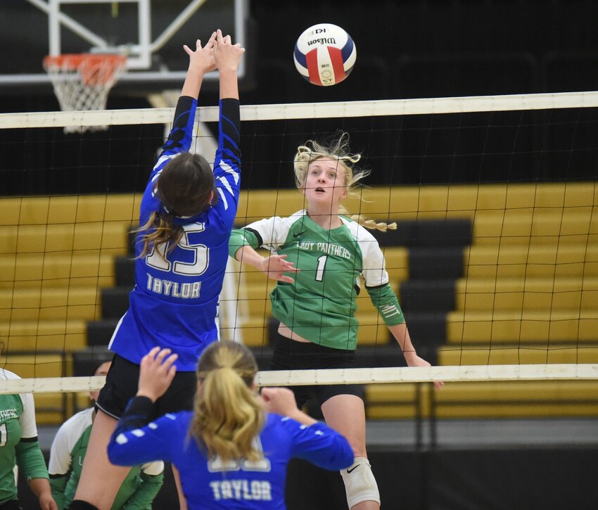 Yellville-Summit's Abby Methvin, pictured hitting against Taylor in the state tournament, was named to the Baxter Bulletin All-Area volleyball team for the second time in her career after leading the Lady Panthers to the state quarterfinals.