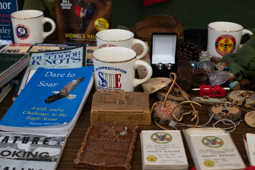 On display at Pittsboro Troop 93's 75th anniversary celebration Saturday were a collection of scouting memorabilia from Mack Thorpe, the troop's assistant scoutmaster. Thorpe's collection includes unique coffee mugs and old guide books.
