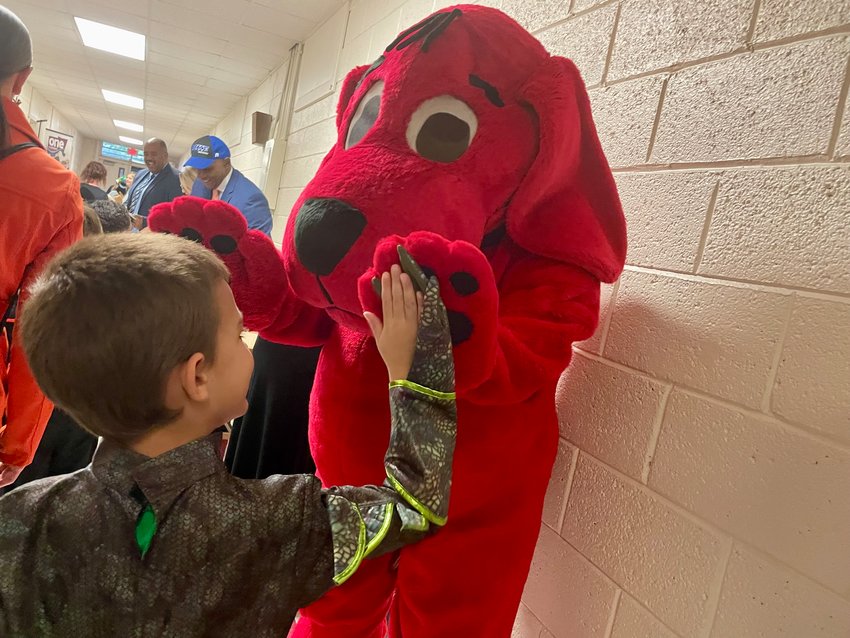 Clifford the Big Red Dog gave hugs and high fives to Pittsboro Elementary students as part of Chatham County Schools Book-or-Treat on Monday.