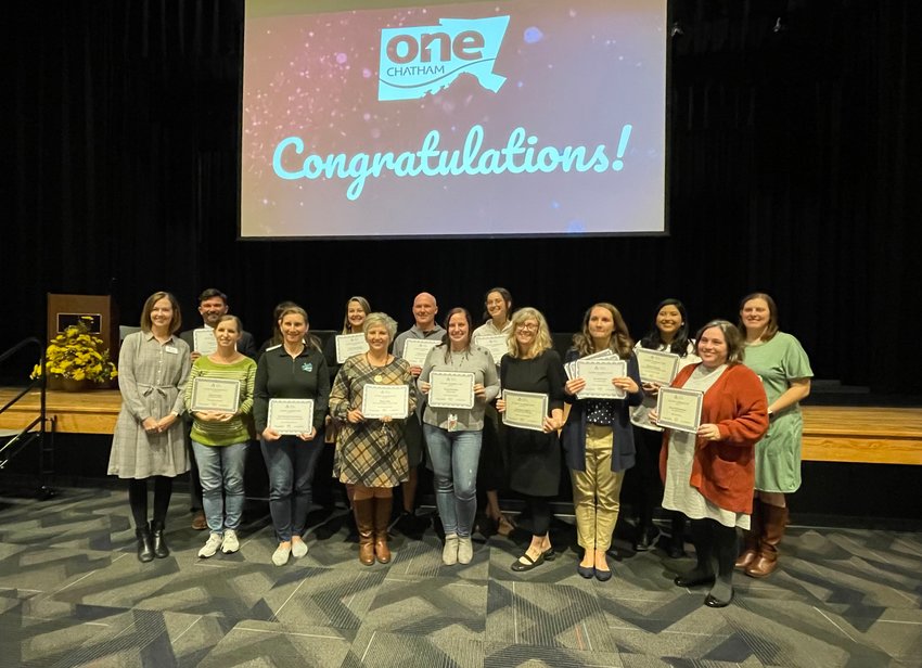 Recipients of Chatham Education Foundation’s.Creative Teaching Grants pose with their awards.Thursday. CEF awarded 22 grants to help make.teaching more creative and engaging in CCS.