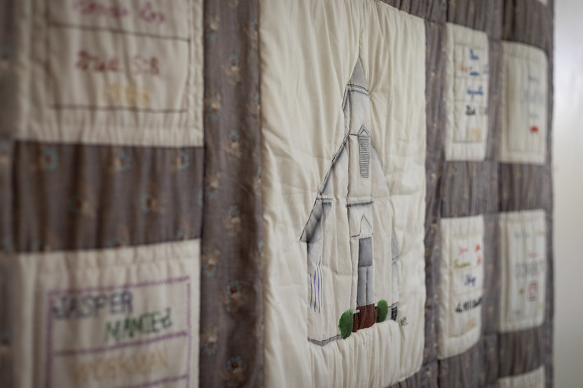 For the 100th anniversary of Merry Oaks Baptist Church in 1988, each family in the congregation sewed a quilt square. The result is a visual record of the community’s history. The quilt now hangs in the fellowship hall as a reminder of the bonds between generations.