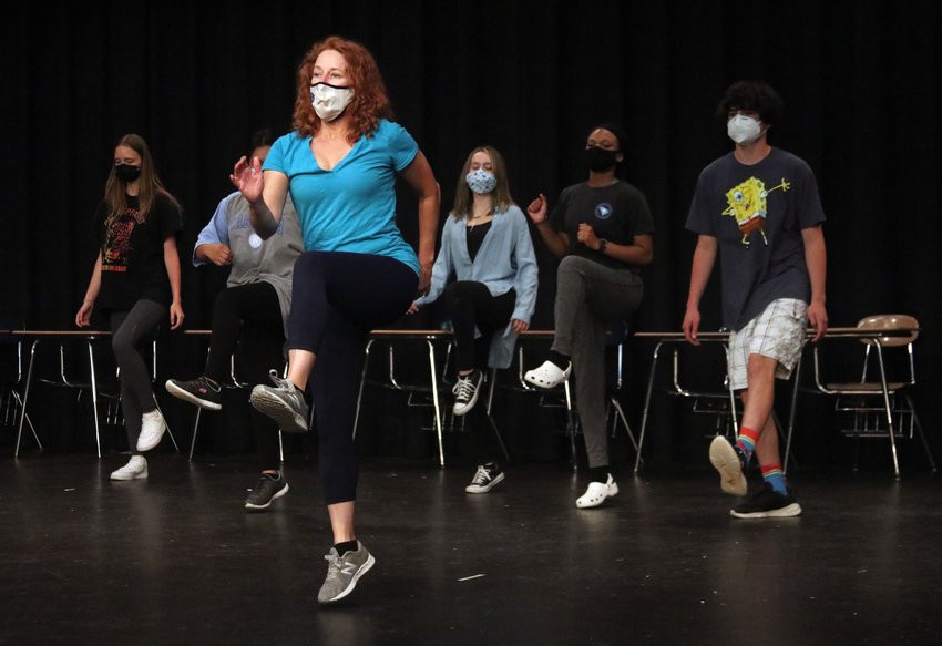 Peggy Taphorn, a Broadway performer and producing artistic director for Temple Theatre in Sanford, leads an after-school theater dance workshop for Jordan-Matthews High School students. This workshop offered in partnership with Chatham Arts Council was one of the first in-person events in 2021 after pandemic lockdowns.