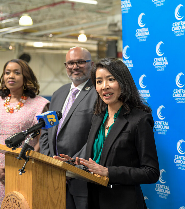 Van Anh Nguyen, VinFast CEO of U.S. manufacturing, spoke with reporters at the E. Eugene Moore Center in Sanford.