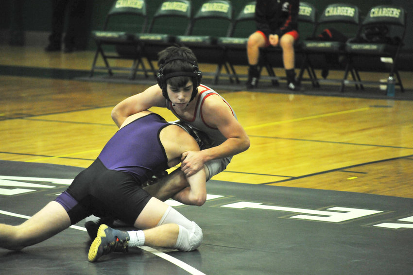 In the Battle of Chatham County Wrestling event at Northwood High in Pittsboro in 2019, Chatham Charter&rsquo;s Chandler Steel takes down Chatham Central&rsquo;s Hunter Bray in competition. Steel&rsquo;s pin of Bray stopped the match with an automatic win.