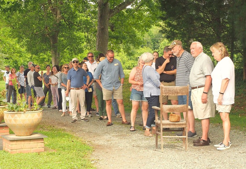Local pottery Mark Hewitt&rsquo;s first public kiln opening since the COVID-19 pandemic felt like a homecoming. Here, customers lined up on Johnny Burke Road in Pittsboro over the weekend to view pottery and purchase pieces.