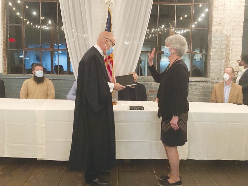 Pittsboro Mayor Cindy Perry is sworn in for her 2021-23 term by Judge Joe L. Webster in this file photo.