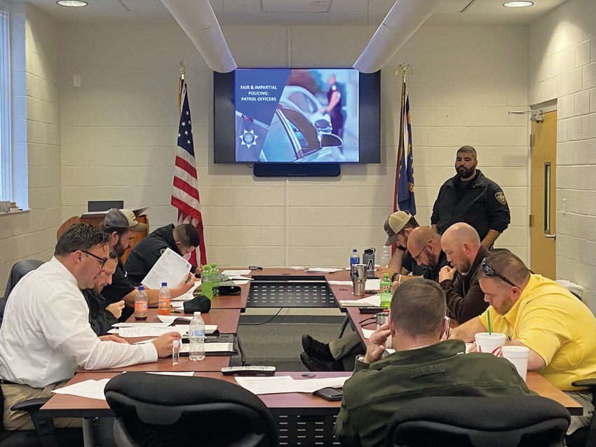 Officers from the Siler City police department take part in a training course on fair and impartial policing.