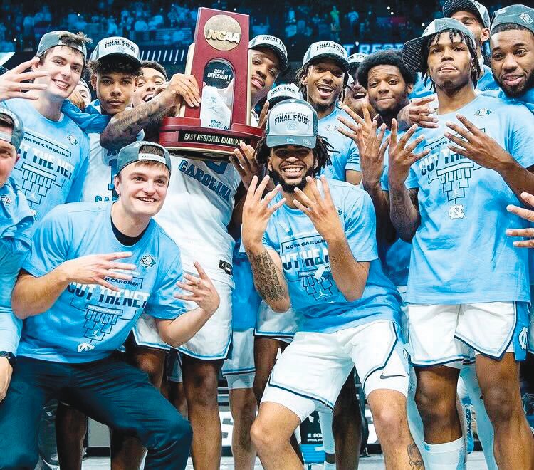 The No. 8 UNC Tar Heels celebrate after defeating the No. 15 St. Peter's Peacocks in the Elite Eight last Sunday. With the win, UNC advances to its 21st Final Four.