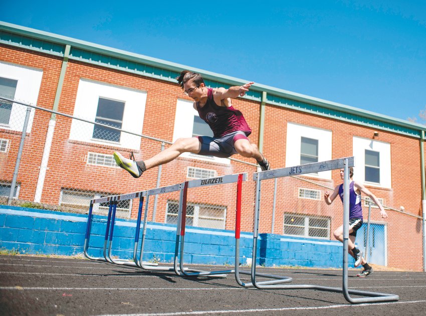 Seaforth freshman Wyatt Parker clears a hurdle during the Chatham County Invitational on Saturday at Jordan-Matthews High School. Parker, who placed 7th in the men's 300-meter hurdles, was praised by his coach, Tommy Johnson, for 'getting everything right' during the event.