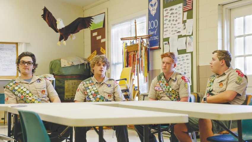 Boy Scouts Anthony Trotter, Andrew Trotter, Logan Quinlan and Peter Droese discuss their quest for Eagle Scout rank at Troop 93's scout hut in Pittsboro.