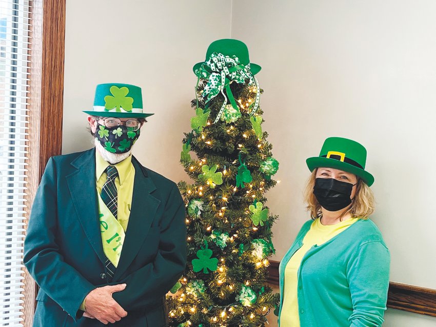 Bill Widman, left, poses with Eastern Chatham Senior Center manager Liz Lahti during the Council on Aging&rsquo;s Saint Patrick&rsquo;s Day celebration in Siler City in March.