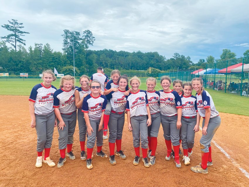 The West Chatham 12U All-Stars (from left: Hadley Brewer, Lillie Poe, Adison Gardner, Logan Thompson, Ruby Parks, Natalie Garner, Blair Hill, Mollie Oldham, Ella Parks, Lilly Allen, Aubrey Covington, Nora Baxter) pose after defeating Pembroke in the N.C. Dixie Youth Softball Ponytails State Championship on July 13, 14-2, to punch their ticket to the Dixie Youth World Series in Louisiana.